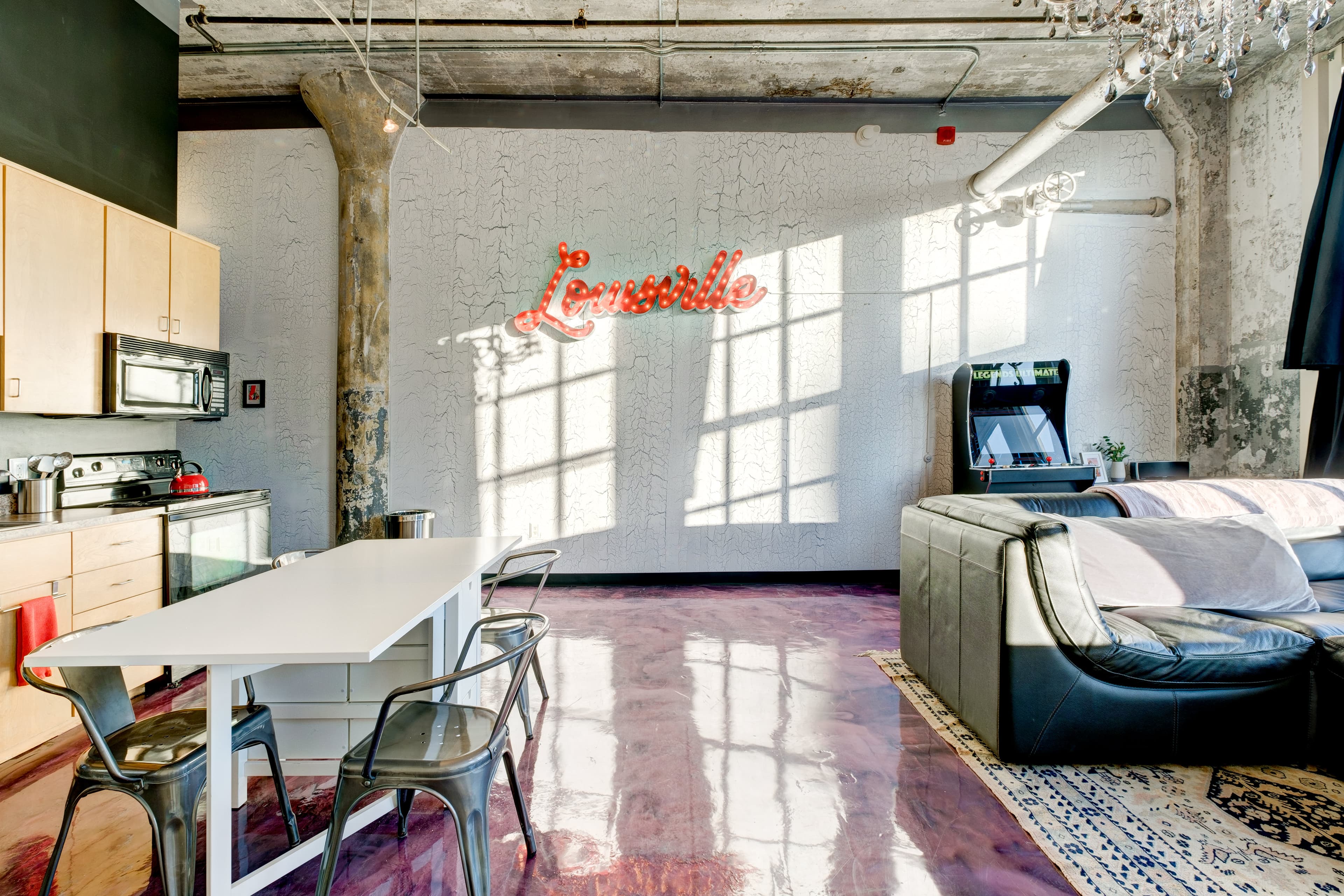 Downtown Louisville loft with large windows and city views
